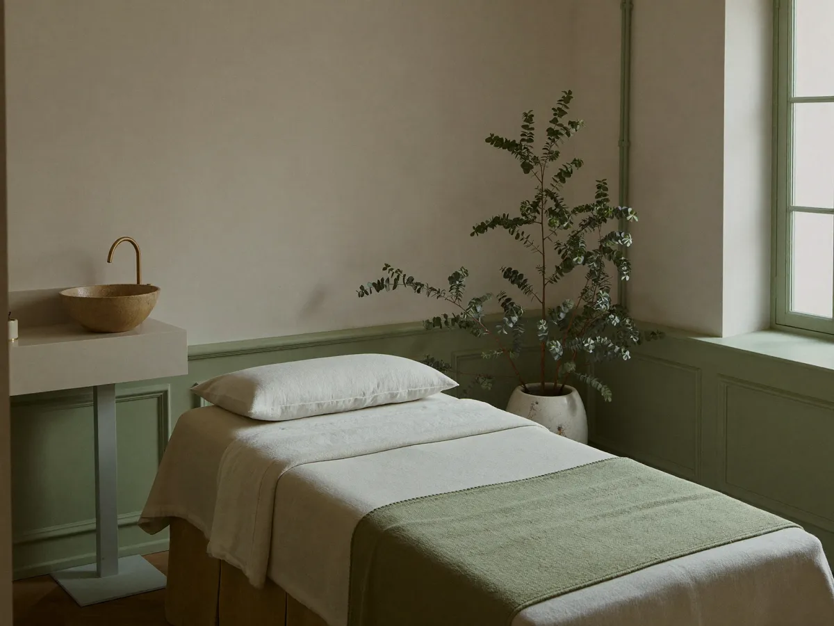 Treatment room with eucalyptus and sage panelling